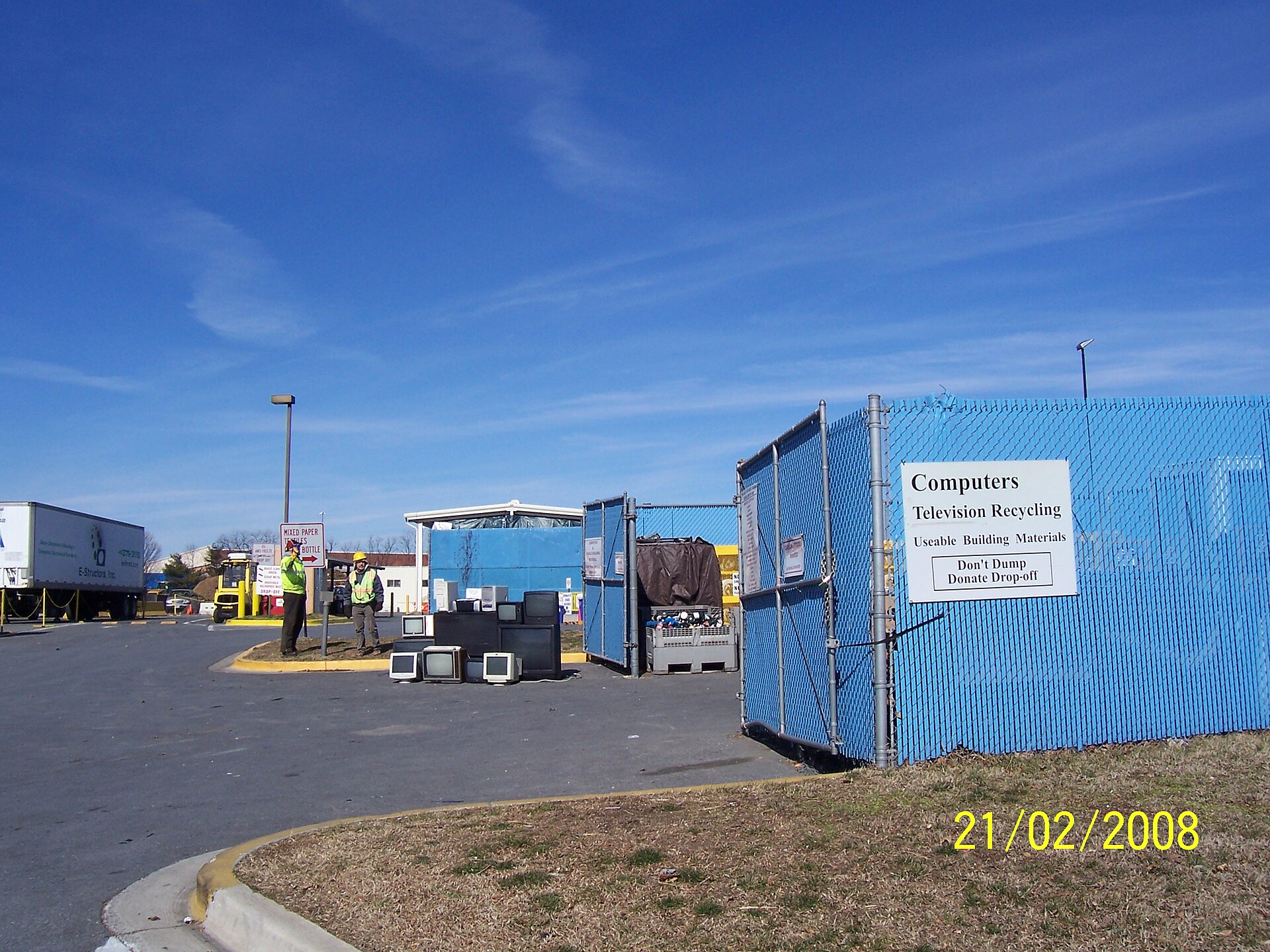 Containers at an electronics recycling and reuse facility